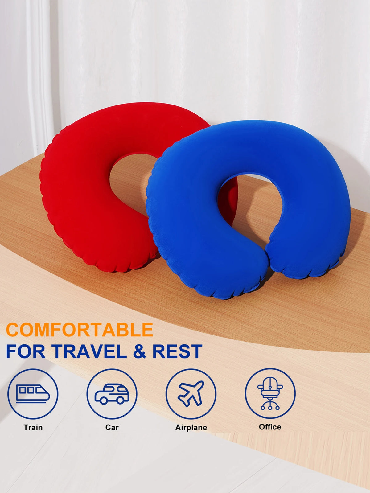 Two inflatable U-shaped neck pillows in red and blue resting on a wooden surface, shown with travel icons.
