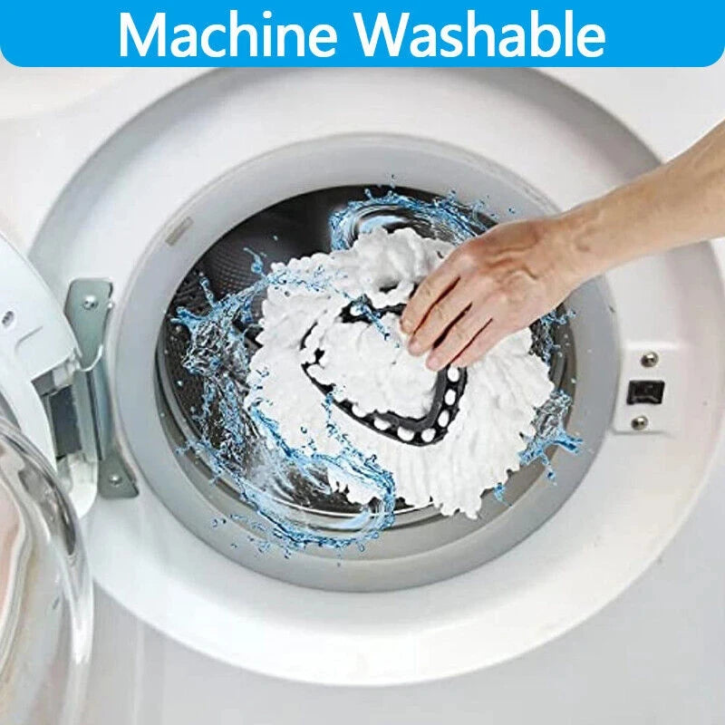 A hand is cleaning a spin mop with white microfiber pads inside a washing machine drum.