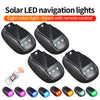 Four pairs of solar LED navigation lights with remote controls and various colored strobe lights