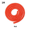 A coil of red cable protector sleeve for Xiaomi M365 electric scooters.