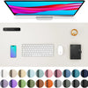 A desk pad featuring a monitor, smartphone, keyboard, mouse, and a collection of colored circles.