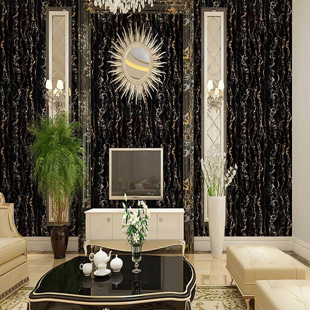 A luxurious interior featuring dark patterned wallpaper, gold accents, and a glass table with white porcelain