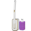 A white disposable toilet cleaning brush with a handle and a purple replacement head is shown.