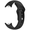 A black silicone replacement strap for a fitness tracker, shown in a curved shape.