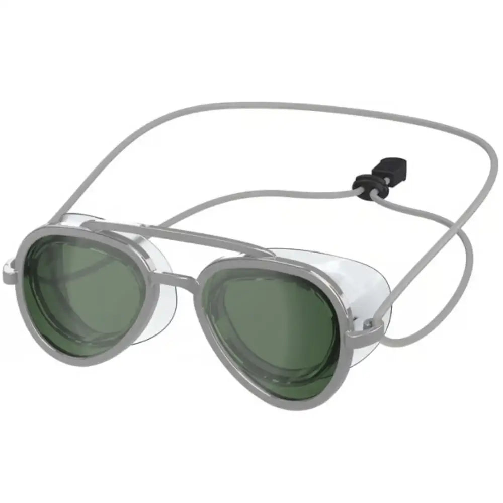 A pair of silver-framed full-view anti-fog swim goggles with green tinted lenses.