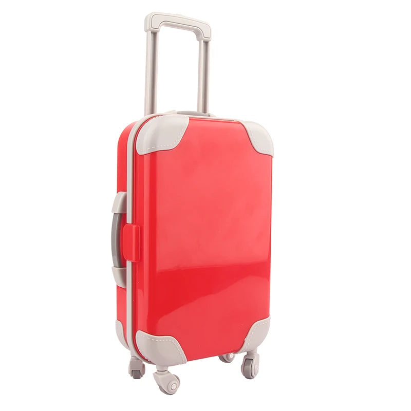 A red and gray doll travel suitcase with a handle and wheels.