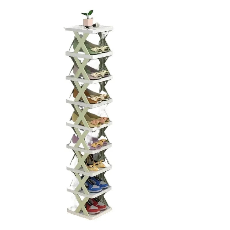 A white 9-tier vertical shoe rack displaying various pairs of shoes.