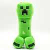 A bright lime green soft plush doll resembling a Minecraft character, featuring pixelated black eyes and body details.