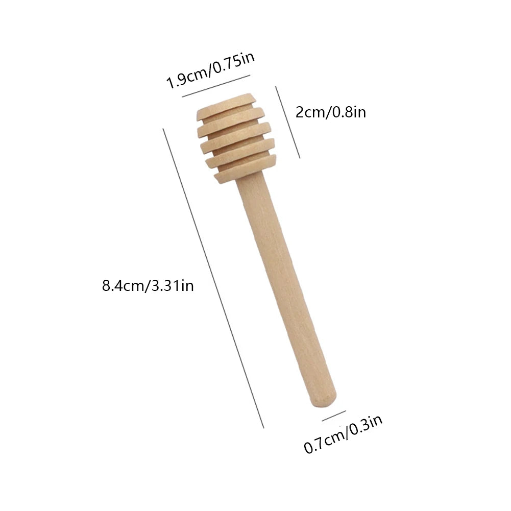 A wooden honey dipper stick with a textured top, showing its dimensions.