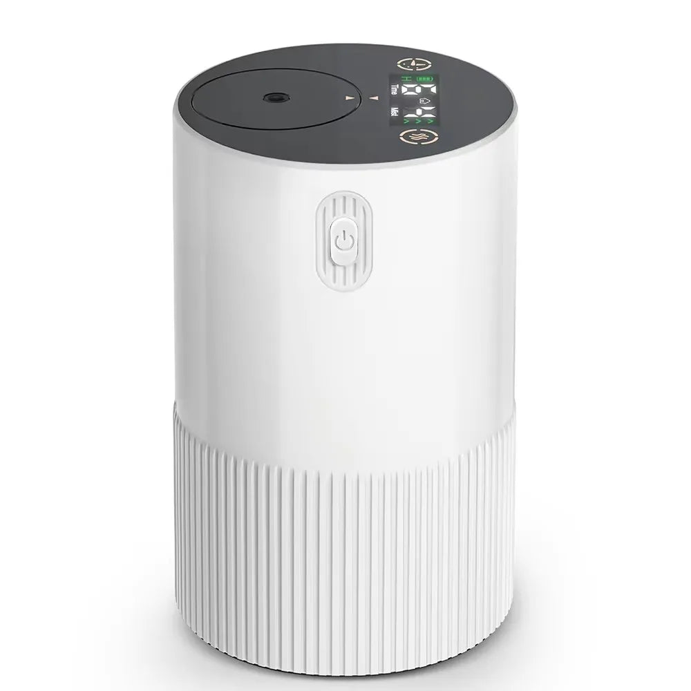 A white portable waterless essential oil diffuser with a black top and vertical ribbed body.