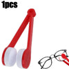 A red microfiber cleaning tool for glasses is shown next to a pair of eyeglasses.