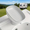 A white suction cup soap dish with a draining tray is shown on a white surface.