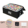 A gift set of 262 alcohol markers in a black box, including a highlighter pen and a storage bag.