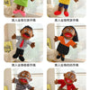 A collection of soft plush full-body hand puppets featuring various skin tones and facial expressions.
