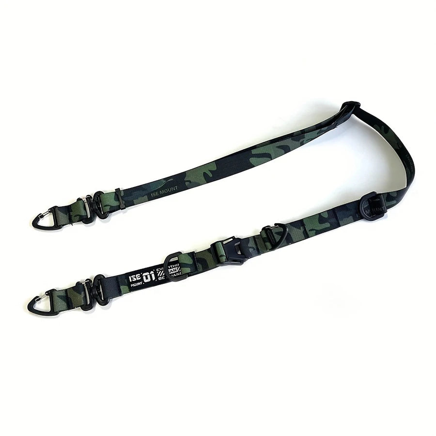 A dark green and brown camouflage strap for a quick-release adjustable crossbody bag, featuring a hanging ring.