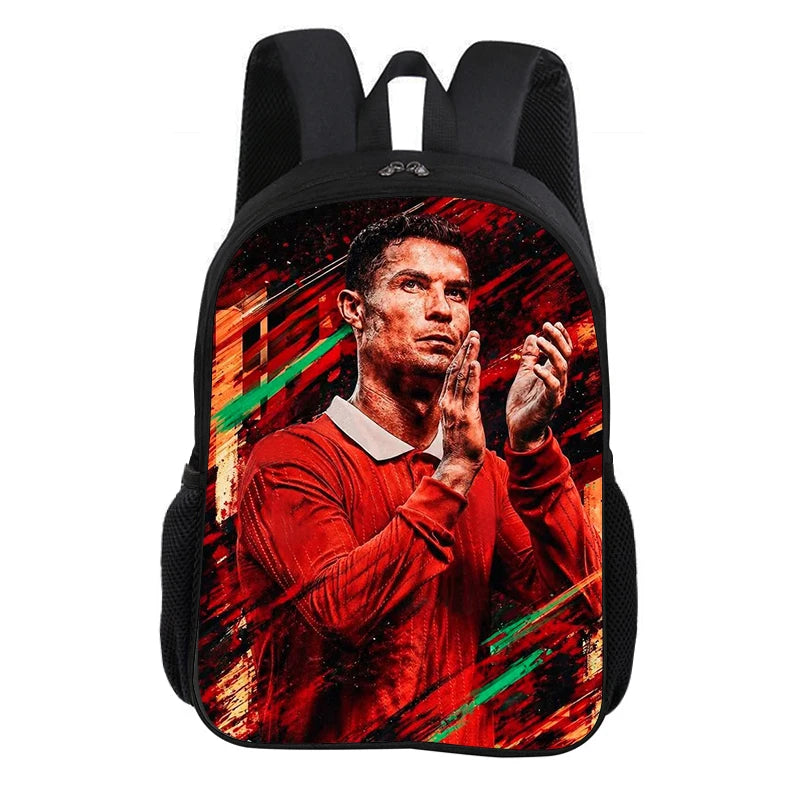 A black backpack featuring a graphic of a soccer player in a red shirt with green accents.