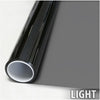 Roll of natural black window film showing a cross-section and light reflection.