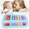 A blue Montessori musical xylophone piano set with colorful wooden bars for toddlers.