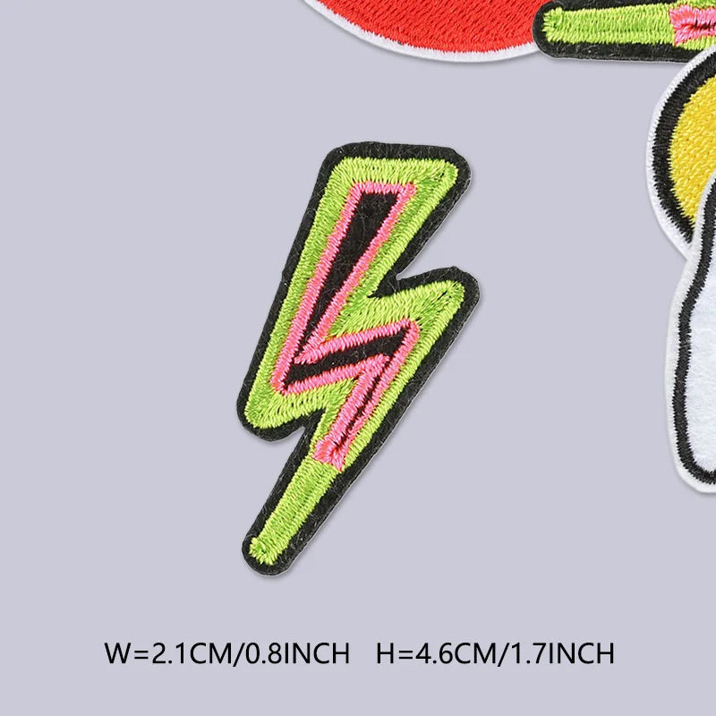A bright neon green lightning bolt embroidered patch on a gray background.