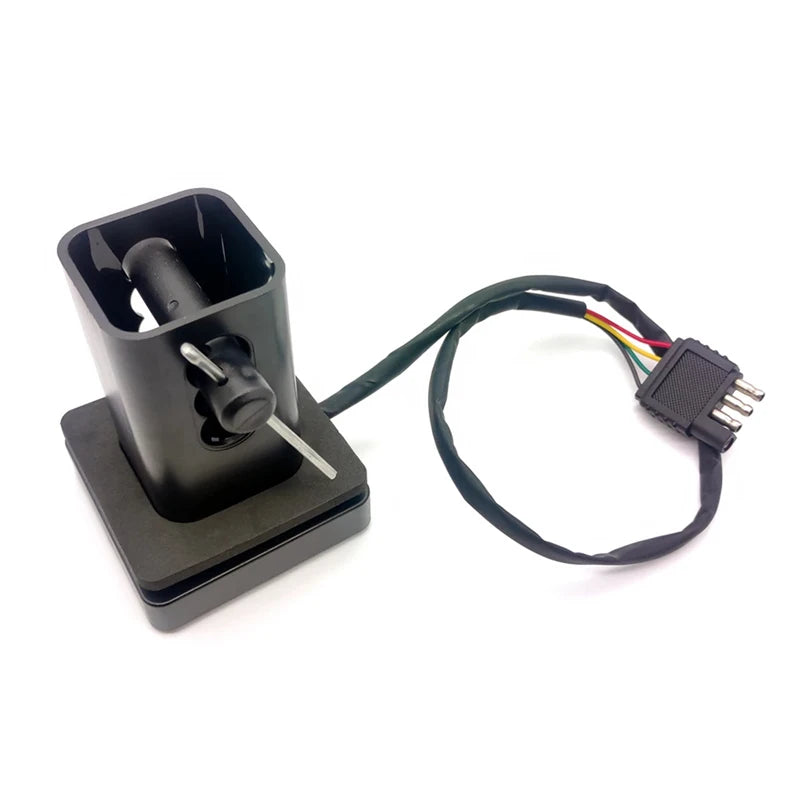 A black universal 12V LED trailer tail light with brake and running functions mounted on a base.