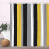 A shower curtain featuring vertical stripes of black, yellow, and gray fabric.