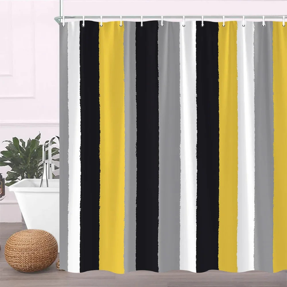A shower curtain featuring vertical stripes of black, yellow, and gray fabric.