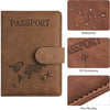 Brown leather passport holder with embossed world map and fine routing details