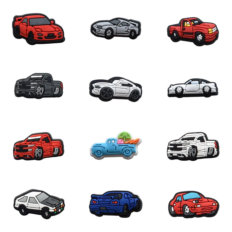 A collection of various red, black, and silver pickup truck PVC pins and charms.