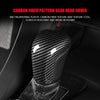 Carbon fiber pattern gear head cover for a vehicle shift knob.