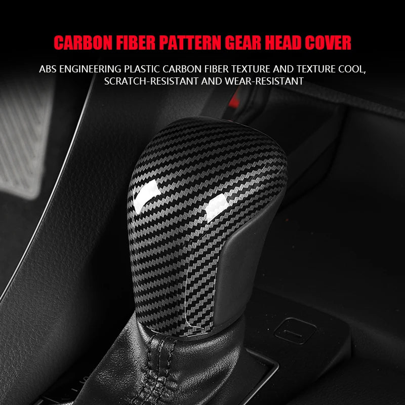 Carbon fiber pattern gear head cover for a vehicle shift knob.