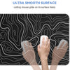 A hand is gliding a mouse across a black topographic map design on a smooth mouse pad.
