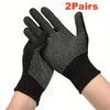 A pair of black knitted anti-slip work gloves with a dotted grip shown on a wrist.