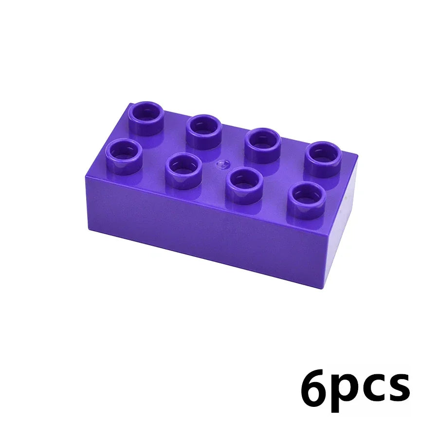 A purple plastic building block set containing six circular blocks.