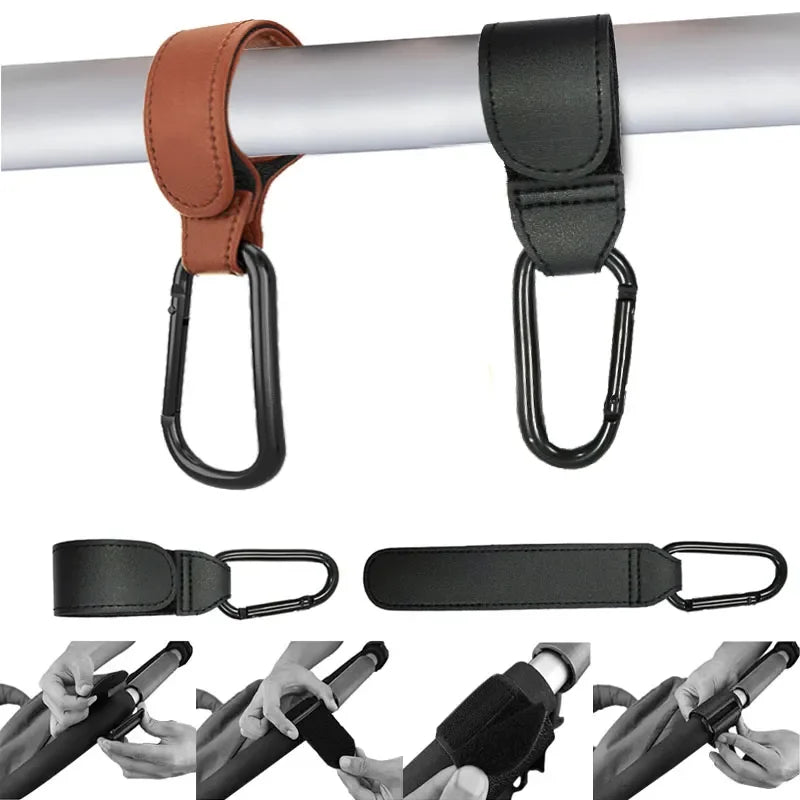 Set of two brown and black PU leather stroller hooks with swivel bags for organizing strollers and prams