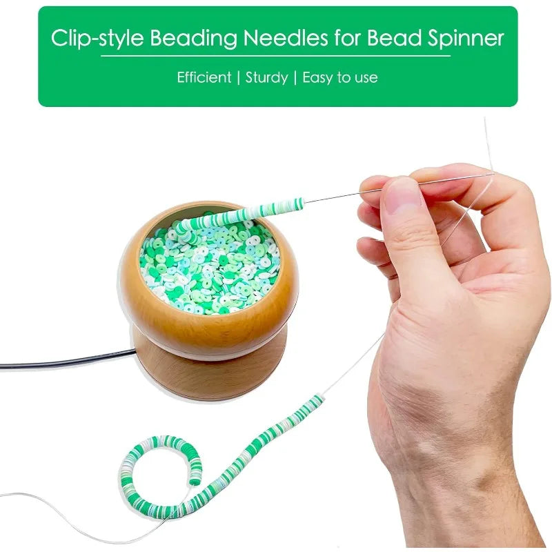 A hand is using clip-style beading needles for a bead spinner, showing the needles and a bowl of green beads.