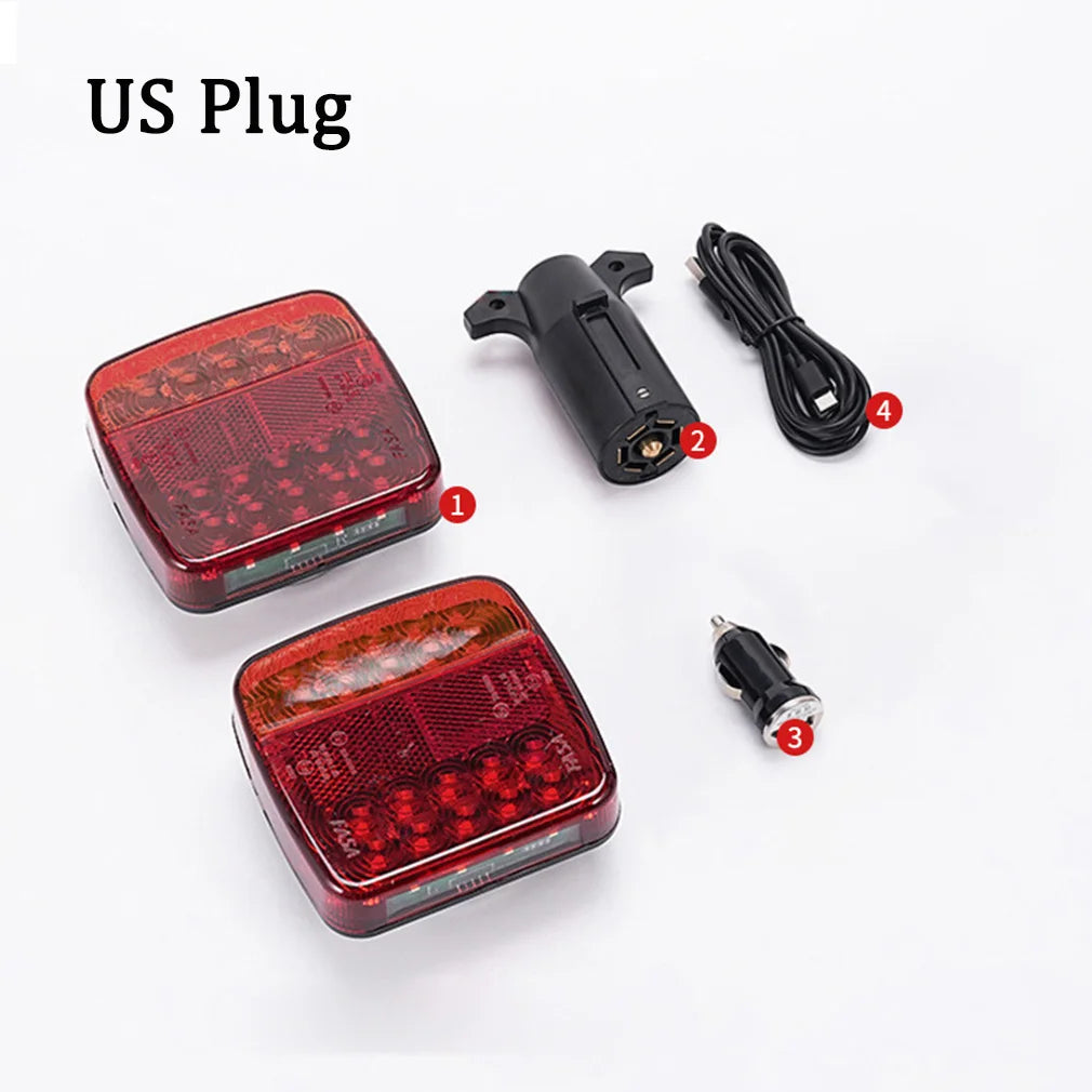 A set of US plug wireless magnetic trailer tail lights including a light unit, remote transmitter, and power cord.