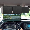 A black adjustable car sun visor extender is mounted on the roof, viewed through the windshield.