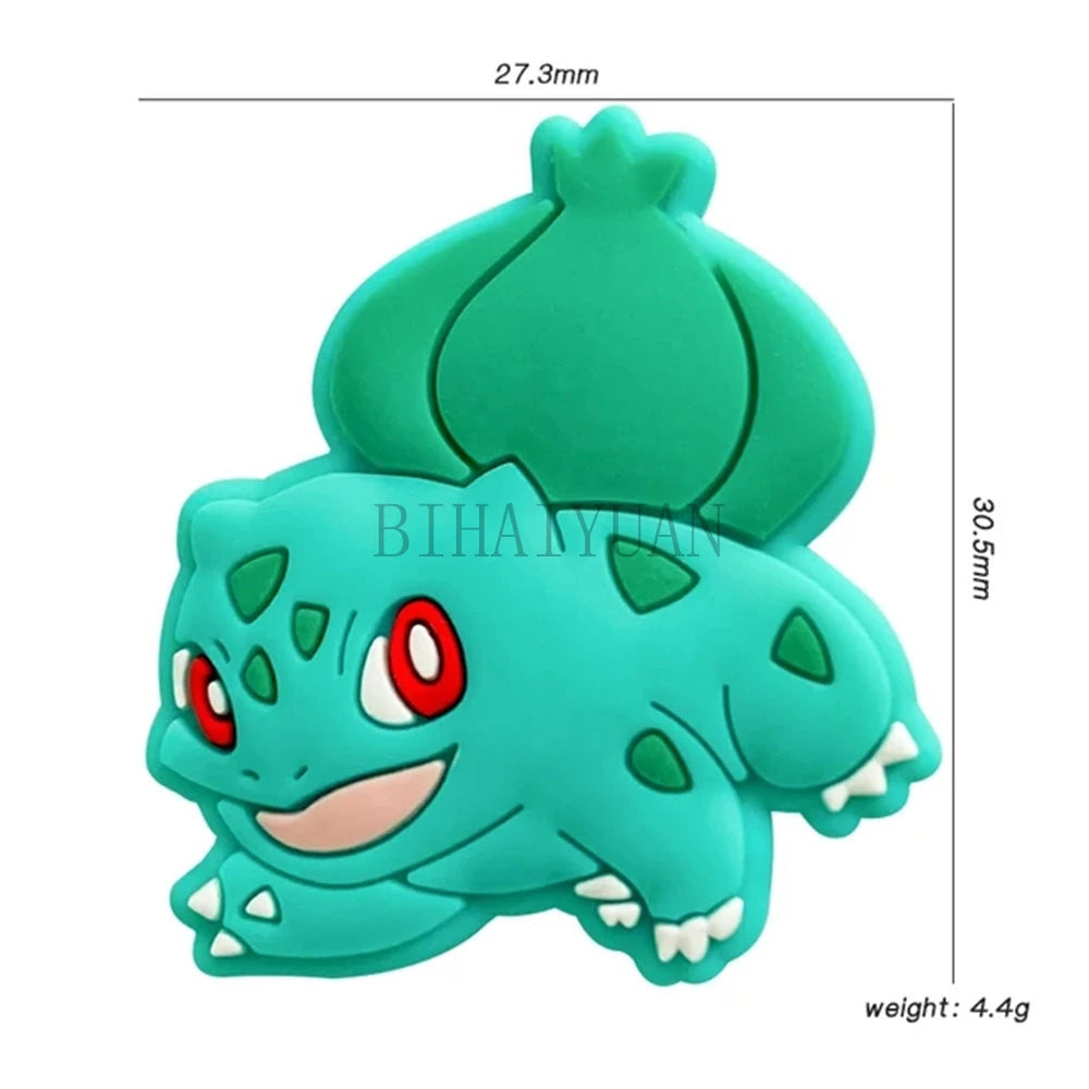 Perle Pokémon en silicone vert clair, en forme de créature avec dents acérées et bouche ouverte.