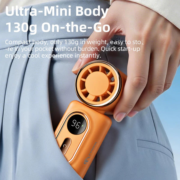 A hand holds an orange portable mini fan with a clip and LED display against a light gray suit jacket.
