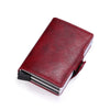 A dark red leather slim wallet with a silver trim and black lining.