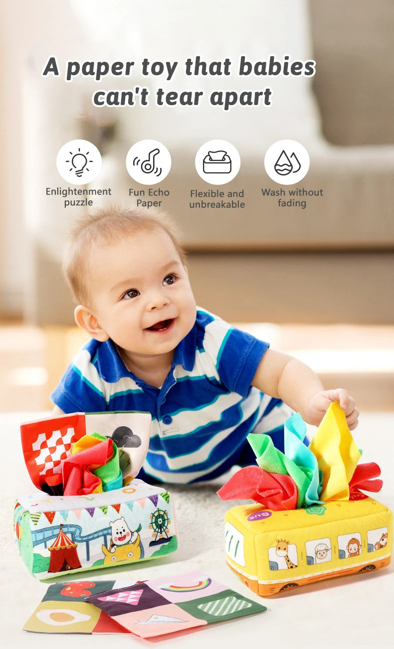 A baby toy featuring a tissue box with crinkle scarves and paper to encourage sensory play.