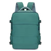 A teal travel backpack with gray accents and straps shown from the back.