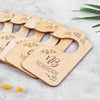 A set of wooden baby closet dividers used as size organizers for newborn to 24 months.