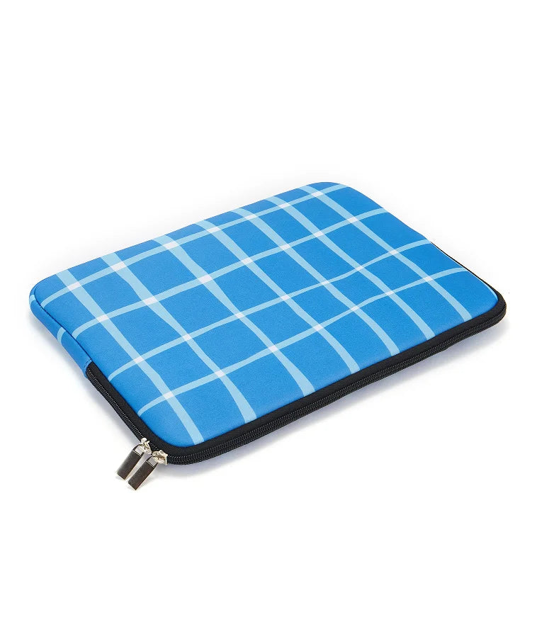 A blue and white checkered laptop sleeve with a black zipper closure.