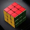 A red and yellow magnetic speed cube with a mirror finish, viewed from above.