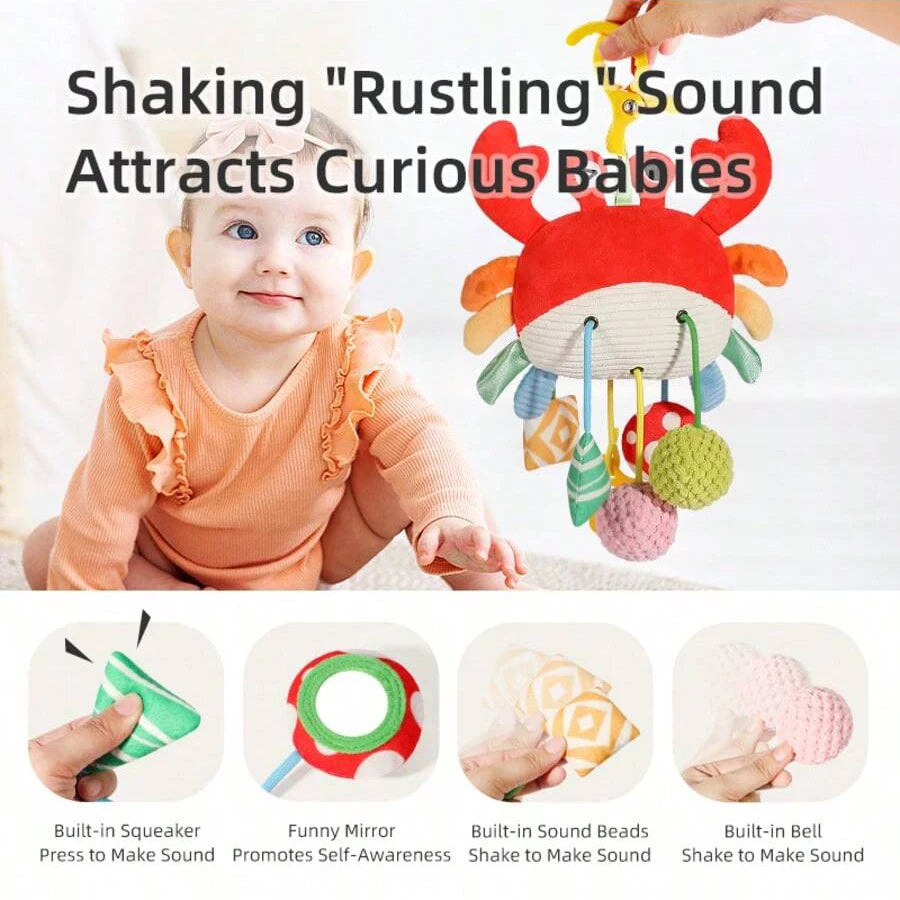A baby is shown interacting with a hanging rattle and teether toy designed to attract curious babies.