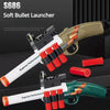 A close-up view of an S686 Soft Bullet Launcher toy gun with a white and green frame and red bullet cartridges.