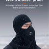 A man wearing a black built-in filter warm and dust-proof balaclava mask in an outdoor setting.