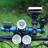 A bicycle handlebar extender mount with multiple LED lights attached for bicycle lighting.