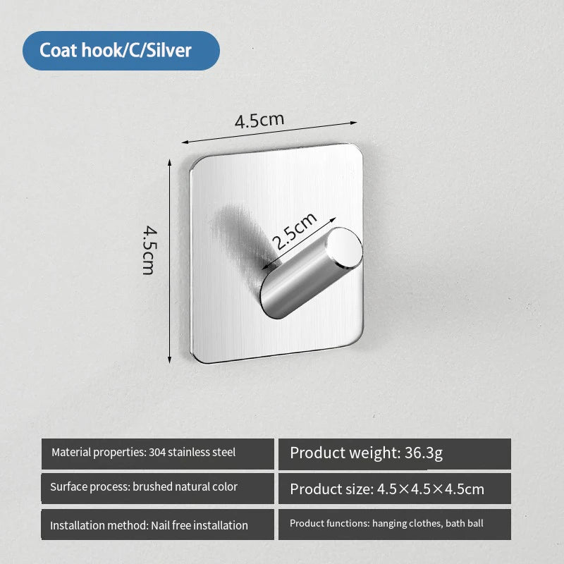A silver coat hook with a brushed natural color finish is shown mounted on a wall.